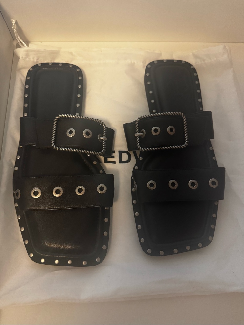 Naked Wolfe Black Leather Stud Slide Sandals with Eyelet Buckles. Never worn.